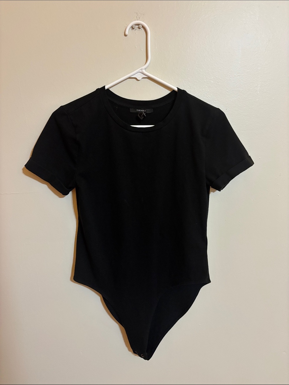 Forever 21 Black Short-Sleeve Round-Neck Bodysuit (women’s L)